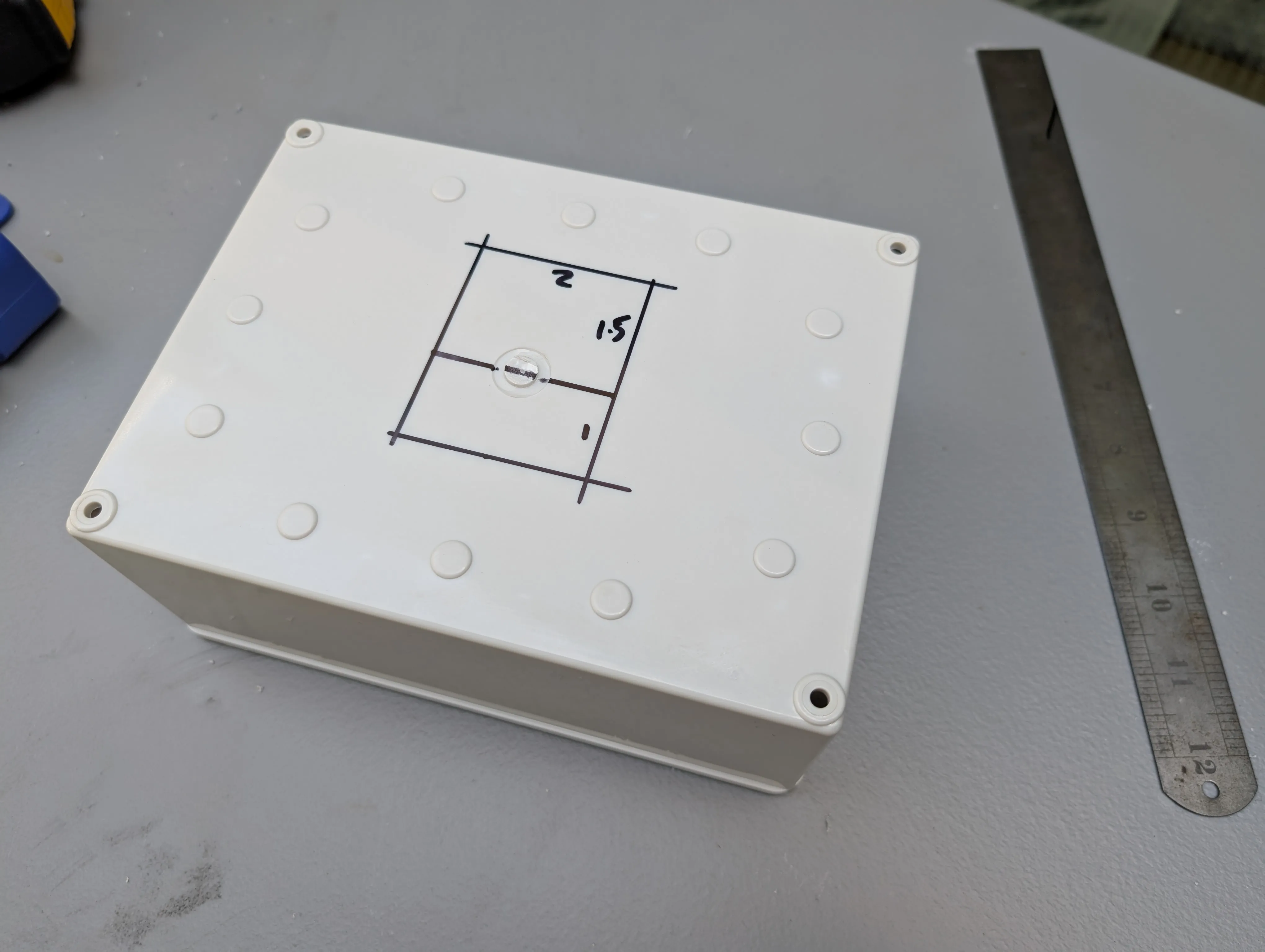 Enclosure Modification Planning - Marking measurements on enclosure lid for cutting