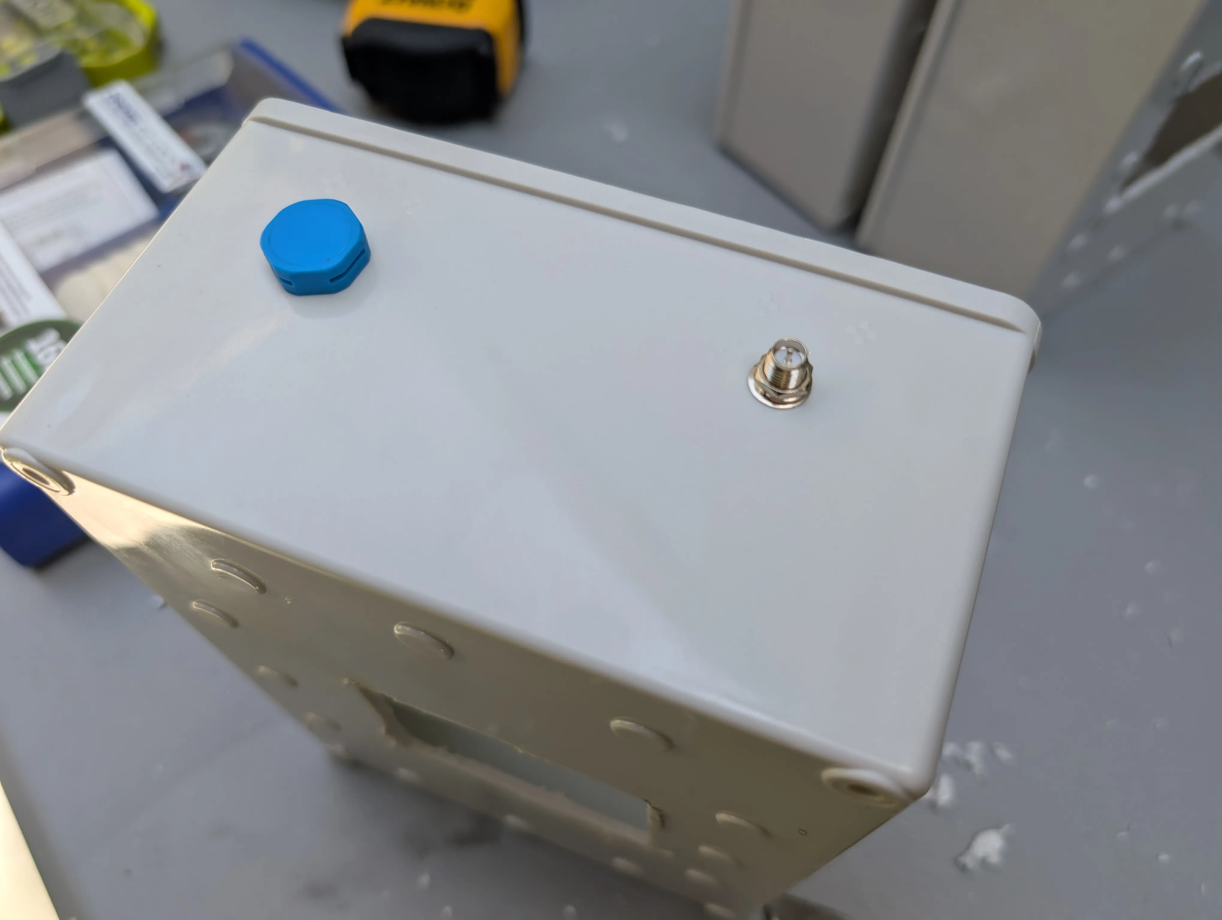 Antenna Mount and Breather Valve - SMA antenna connector installed in enclosure lid for external bluetooth antenna