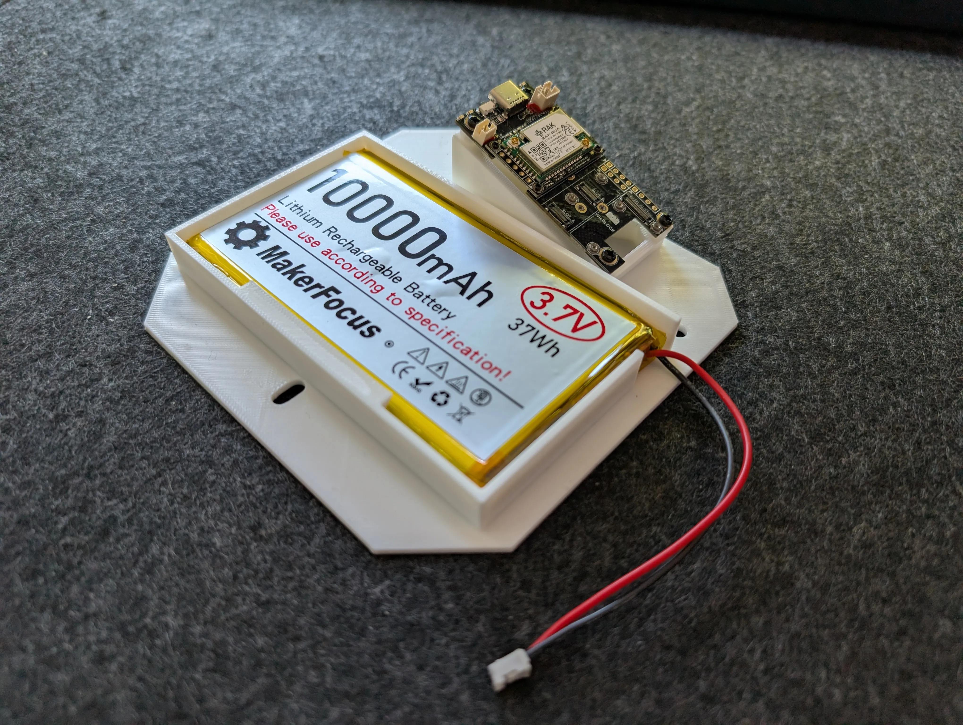 Enclosure Insert - Close-up of enclosure insert with chip mount and battery caddy